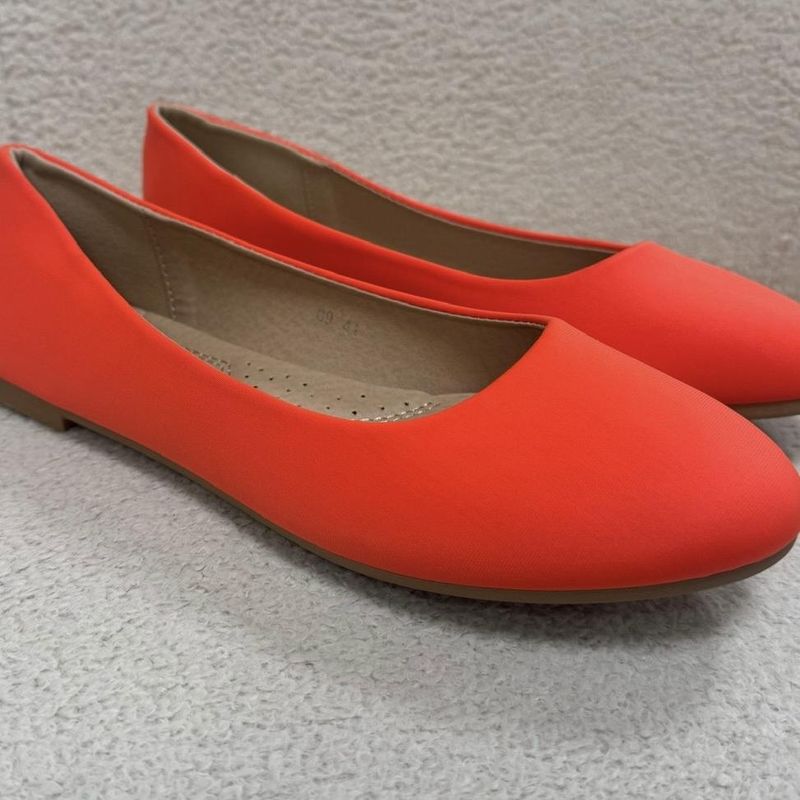 Neon orange shoes